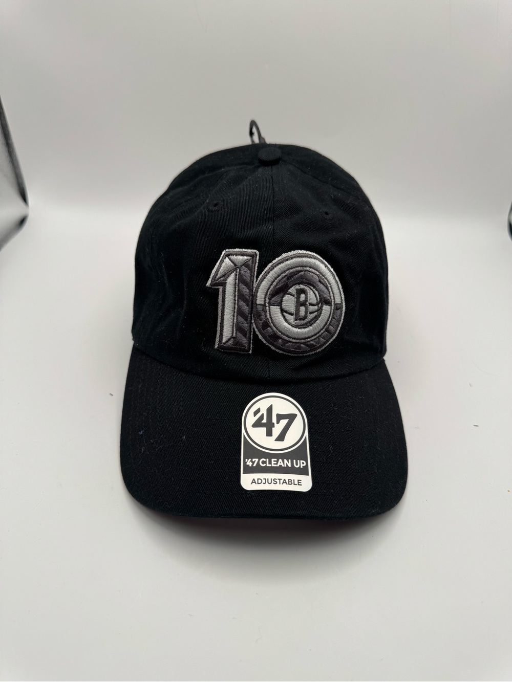 47 Black Cap with White Embroidered Interior Patch